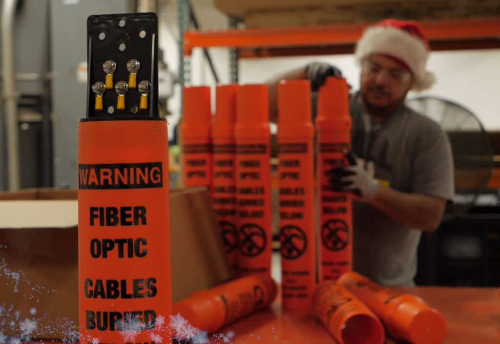 Test Stations being made by worker in a Santa hat