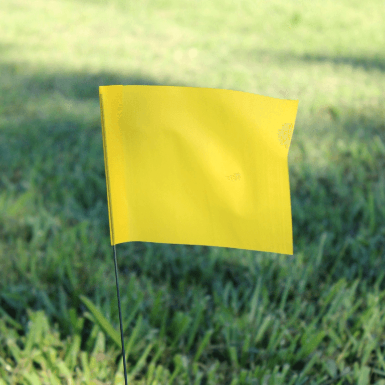 Solid Color Marking Flags In The Field Yellow