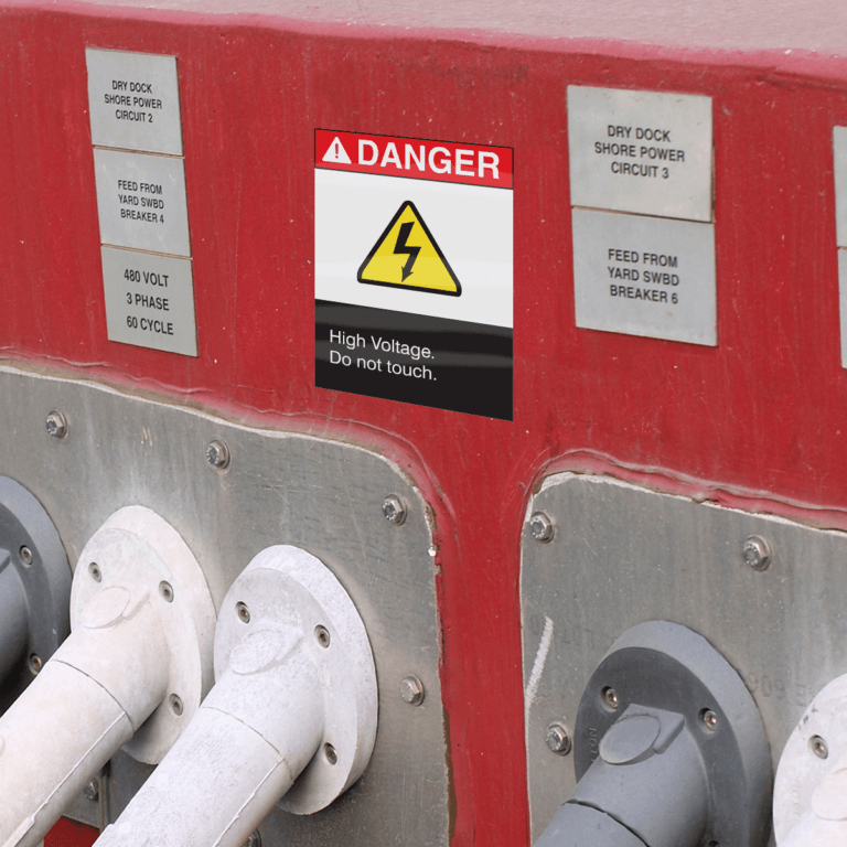 High Voltage Warning Label in the field on a power box