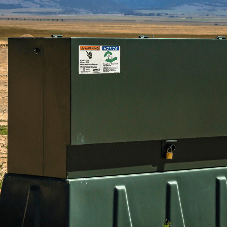 A reflective transformer label used on a power box in the field
