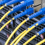 Self Laminating Pre-Printed Wire Marker Books being used to number label cables in a server room