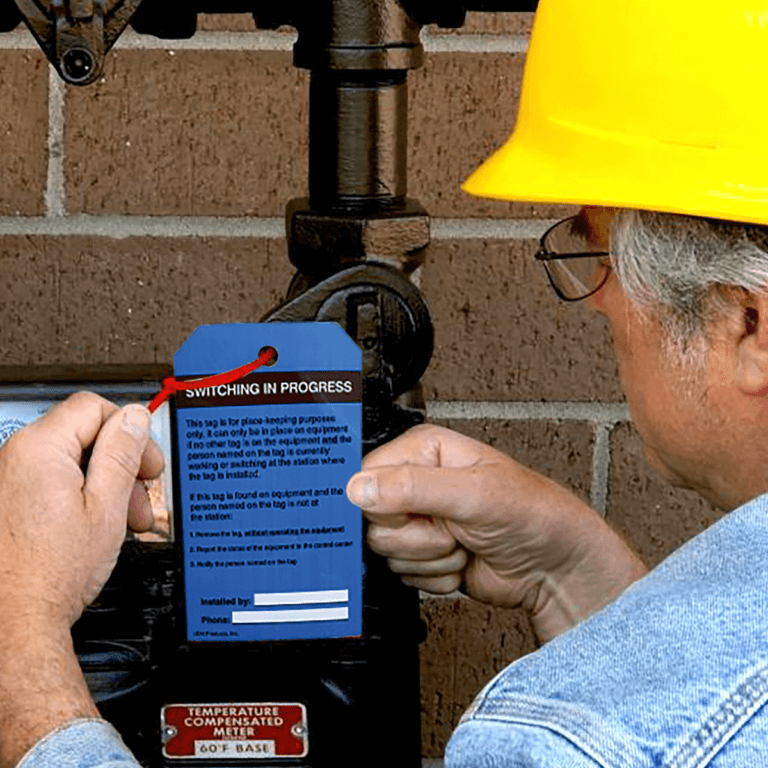 Switchgear Tag being installed on a meter