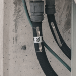 Wire Marker Cards in use marking a line with "POS"